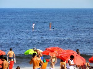 Brazil - Rio - Ipanema Beach  paddle boarders along the