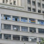 Close-up of the banner in the windows of the top