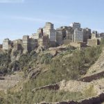 Yemen - Hajjara town built on a rock foundation with traditional