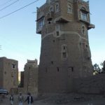 Yemen - Unique rock and mud tower house; note two