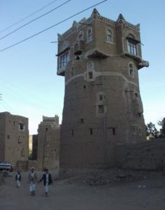 Yemen - Unique rock and mud tower house; note two