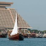 About hundred and fifty Qatari traditional dhows sailing near the