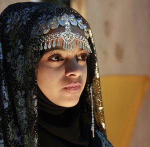 Oman - woman with ceremonial headdress
