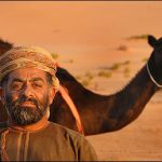 Oman - man with his camel