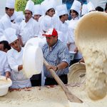 Lebanon - chefs prepare a massive bowl of hummus, weighing