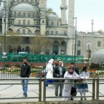 Turkey, Istanbul - pedestrians along the harbor front in front