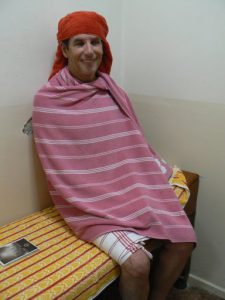 Turkey, Istanbul - Michael wrapped in towels in Cemberlitas bath house