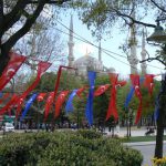 Turkey, Istanbul - flags at Blue Mosque