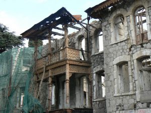 Once glamorous derelict building, probably a dacha summer home that's been