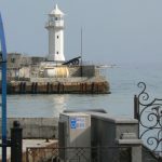 Lighthouse across the Yalta harbor