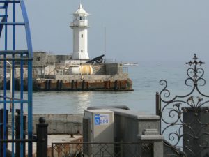 Lighthouse across the Yalta harbor