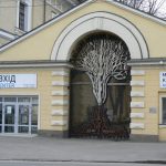 Ukraine, Kiev - unusual iron tree on glass wall of