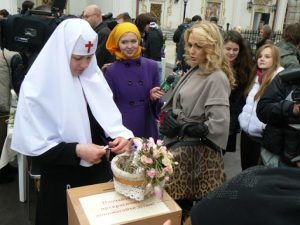 Ukraine, Kiev - Pechersk Lavra; Easter flowers and visitors; Olga Samskaya, movie