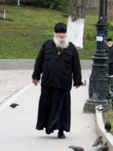 Ukraine, Kiev - Pechersk Lavra; typical orthodox clothing