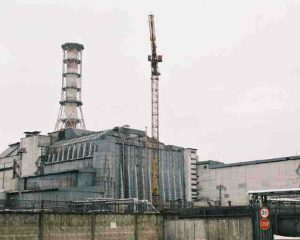 Ukraine, Chernobyl - The cement sarcophagus enclosing the plant;  after