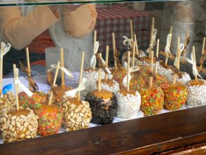 Ukraine, Lviv - central city:  craft stall selling candied apples