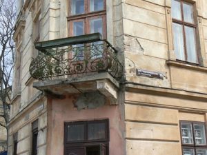 Ukraine, Lviv - central city ornamental balcony and decay