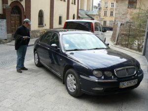 Ukraine, Lviv - central city: admiring a new Rover