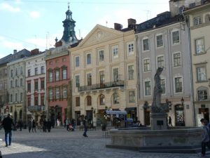 Ukraine, Lviv - central city with fountain  and cobblestone streets
