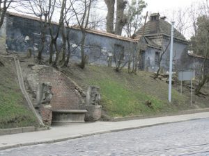 Ukraine, Lviv - old park fountain in front of private