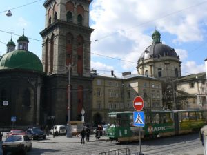Ukraine, Lviv - Dormition Church and bell tower on left; Dominican