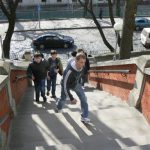 Ukraine, Lviv - children coming to pay respects at St