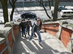 Ukraine, Lviv - children coming to pay respects at St