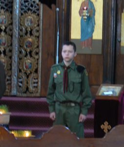 Ukraine, Lviv - St Michael's church; on Easter  Sunday Boy