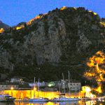 Illuminated night view of the old fortress walls