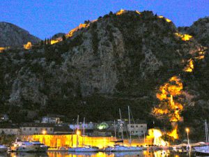 Illuminated night view of the old fortress walls