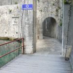 Old town walls with entry draw bridge