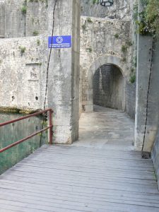 Old town walls with entry draw bridge
