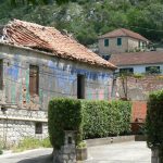 Entering Kotor City; old and new buildings