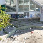 Montenegro, Podgorica: trash outside sports complex (swimming pool unused)