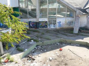 Montenegro, Podgorica: trash outside sports complex (swimming pool unused)