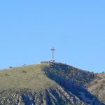 Bosnia-Herzegovina, Mostar City: huge cross on the hill overlooks numerous