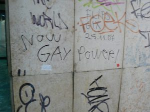 Bosnia-Herzegovina, Sarajevo City: train station wall with 'gay power' graffiti