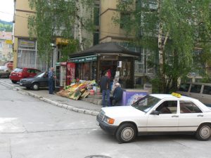 Bosnia-Herzegovina, Sarajevo City: typical corner grocery kiosk and diesel taxi