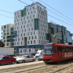 Bosnia-Herzegovina, Sarajevo City: modern buildings and modern trolley
