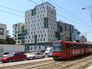 Bosnia-Herzegovina, Sarajevo City: modern buildings and modern trolley