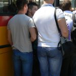 Bosnia-Herzegovina, Sarajevo City: gay guys waiting to board a bus