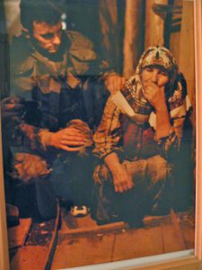 Inside the Tunnel Museum; photo of a distressed refugee