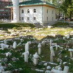 Bosnia-Herzegovina, Sarajevo City: old cemetery ruins and small new mosque