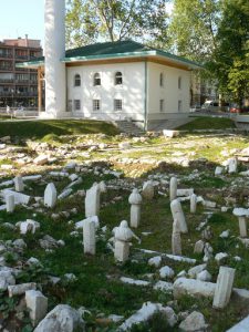 Bosnia-Herzegovina, Sarajevo City: old cemetery ruins and small new mosque