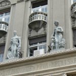 Serbia, Belgrade: family theme socialist statuary on a building