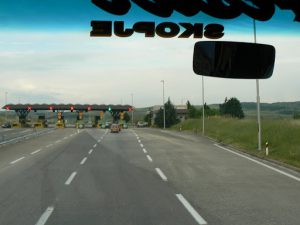 Macedonia, Skopje: toll booth on superhighway, from bus