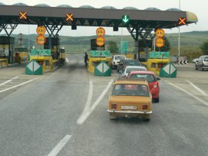 Macedonia, Skopje: toll booth on superhighway, from bus