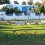 Tunisia: Carthage - modern home with ancient ruins in foreground