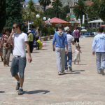 Albania, Saranda city - waterfront promenade; most young people smoke and