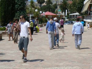 Albania, Saranda city - waterfront promenade; most young people smoke and